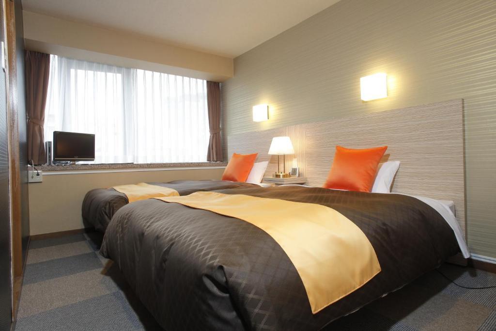 Hotel 1-2-3 Nagoya Marunouchi Rum bild